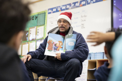 December 22, 2023: Senator Hughes spreads holiday cheer by reading to students as part of his Food for the Brain campaign. 