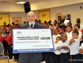 February 11, 2016: Senator Hughes visits Harambee Charter School to deliver a $346,000 21st Century Community Learning Centers grant to its wonderful CEO, Sandra Dungee Glenn.