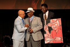 26 de julio de 2019: El senador Hughes y Sheryl Lee Ralph-Hughes son los anfitriones de la 4ª edición de los premios anuales Jazz Legacy Awards.  Los galardonados de este año, Bernard Purdie, Helen Haynes, Gloria Galante y Germaine Ingram, a través de sus logros artísticos, demuestran que el genio de esta música, creada en estas costas, impregnada del esfuerzo, la lucha y el triunfo final del viaje afroamericano, es un reflejo de lo mejor de la humanidad de la historia estadounidense.